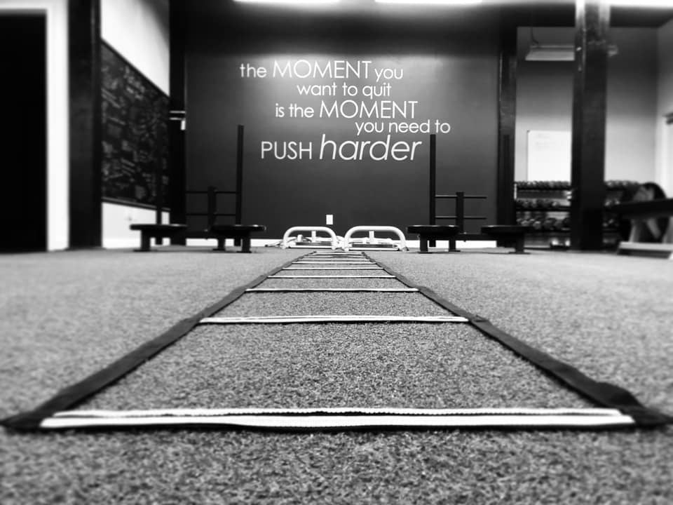 Kristy Agan quote on wall at KA Athletics