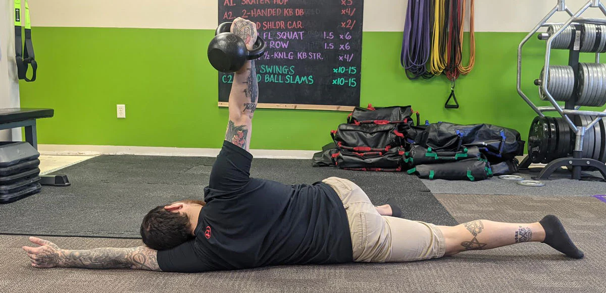 William Sturgeon performs a kettlebell arm-bar