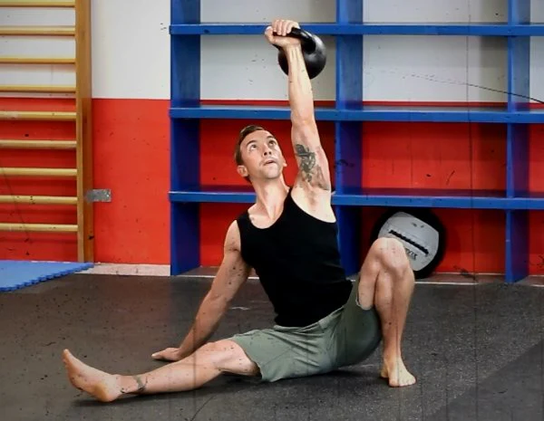 RKC Team Leader Sebastian Muller performs a TGU