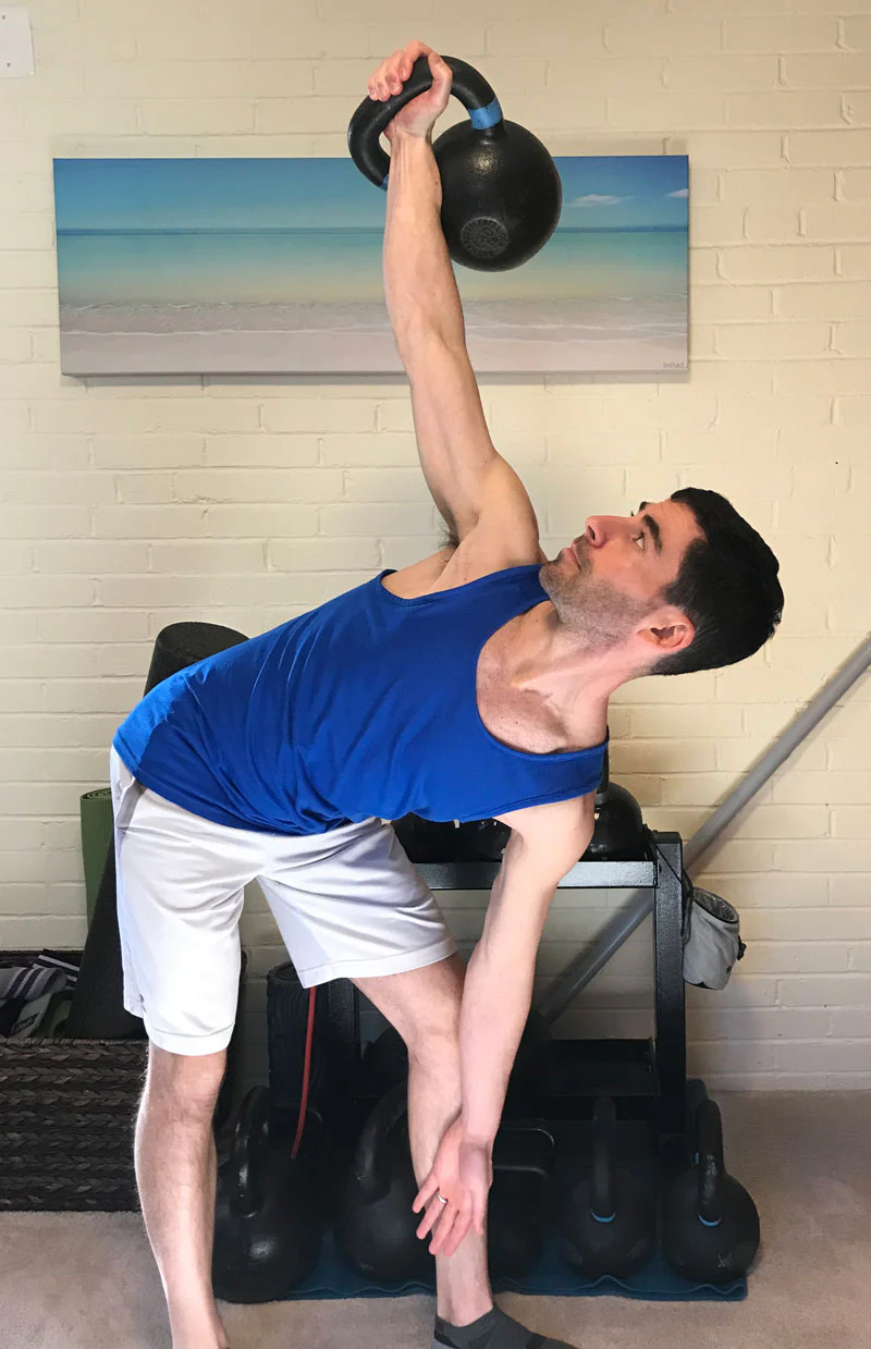 Ryan Jankowitz, RKC-II performing a kettlebell windmill