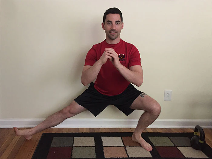 Ryan Jankowitz Cossack Squat with Kettlebell