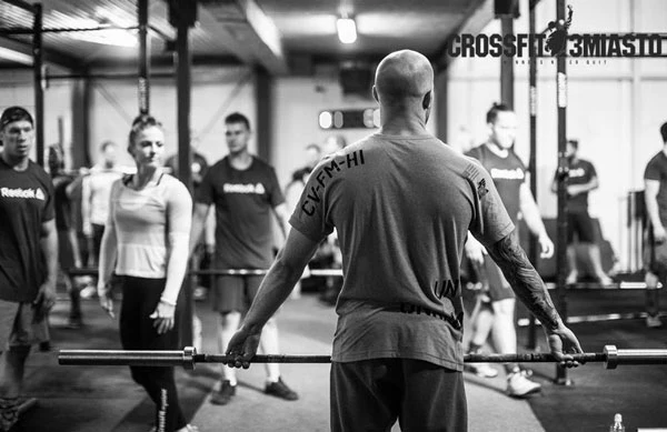 Maciej coaching barbell