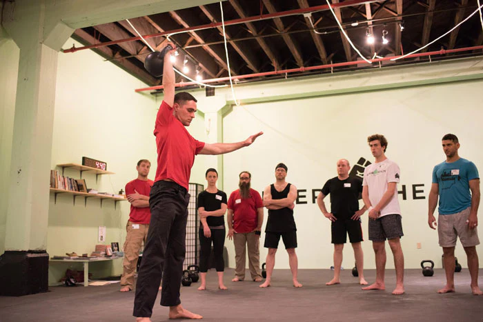 Nick Lynch kettlebell press