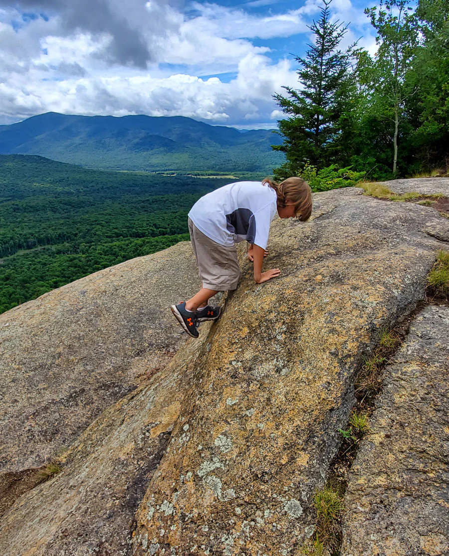 The author's son navigating obstacles on the trail